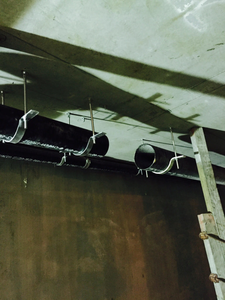 Plumbing pipes showing exposed openings